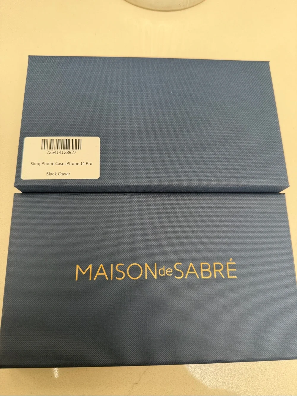 Maison de Sabre Sling Phone Case iPhone 14 Pro in Black Caviar and Gold Hardware